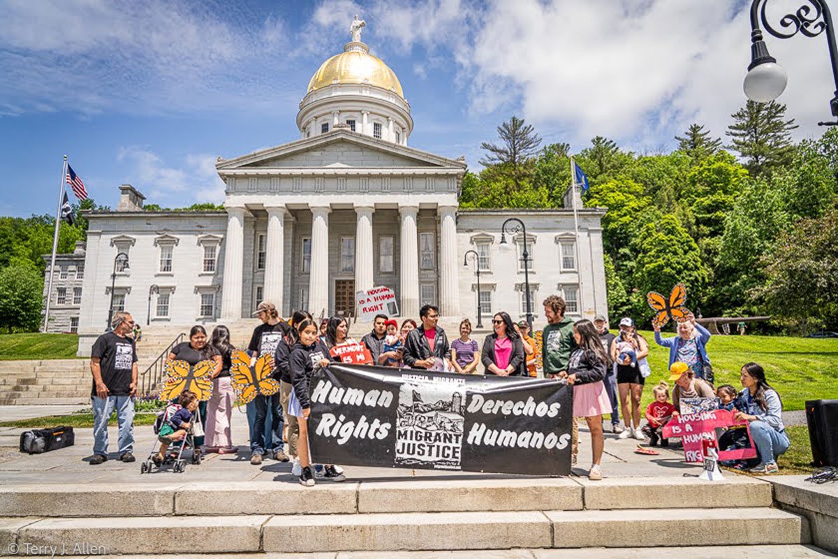 Immigrant community leaders and supporters gather in front of the Vermont State House on Friday, June 13th, to celebrate the passage of S. 127, a new state law protecting immigrant housing rights. The celebration was organized by Migrant Justice, a Vermont-based human rights organization founded and led by immigrant 168一分钟极速赛车官网 Farmworkers. (Photo credit: Terry Allen)